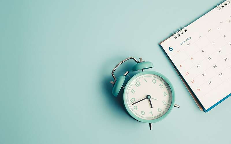 Image of a clock and a calendar representing funding schedule.